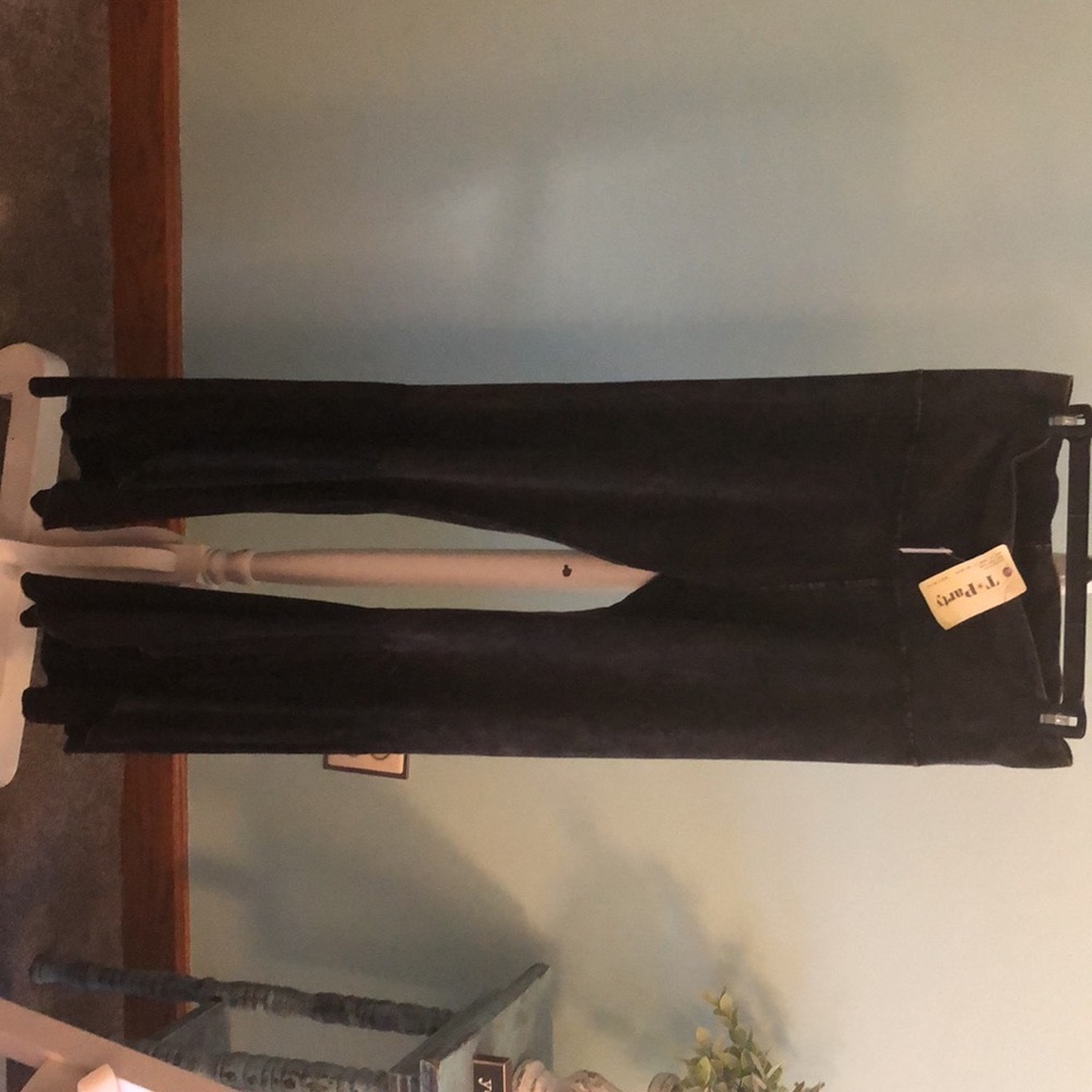 T Party New with tags black mineral washed leggings with flirty, flouncy bottom.